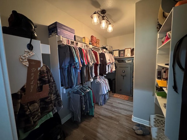 3640 Wingate Blvd, Brookeland, TX 75931 - walk in closet with wood finished floors
