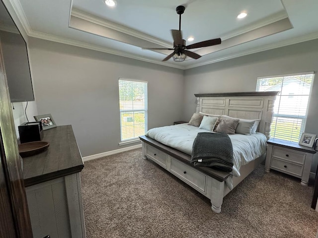 3640 Wingate Blvd, Brookeland, TX 75931 - bedroom featuring a raised ceiling, dark carpet, ornamental molding, and ceiling fan