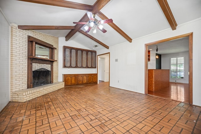 1308 Brook Holw, Lufkin, TX 75904 - unfurnished living room featuring ceiling fan, brick patterned flooring, and a fireplace