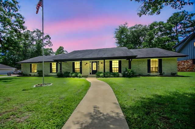 1308 Brook Holw, Lufkin, TX 75904 - single story home featuring a front lawn and brick siding