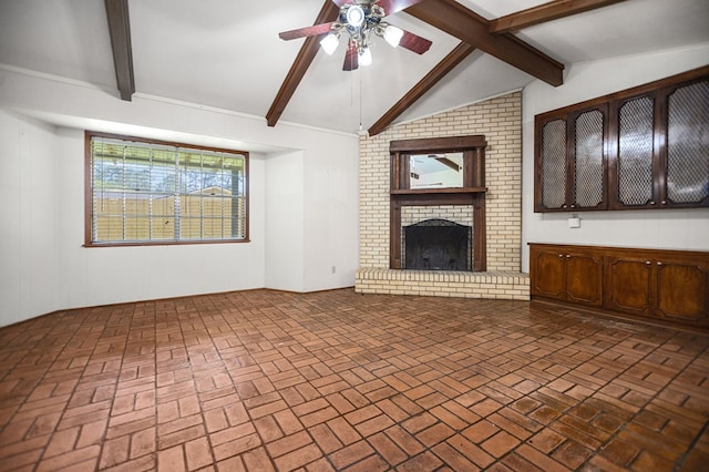 1308 Brook Holw, Lufkin, TX 75904 - unfurnished living room with ceiling fan, a fireplace, and brick patterned flooring