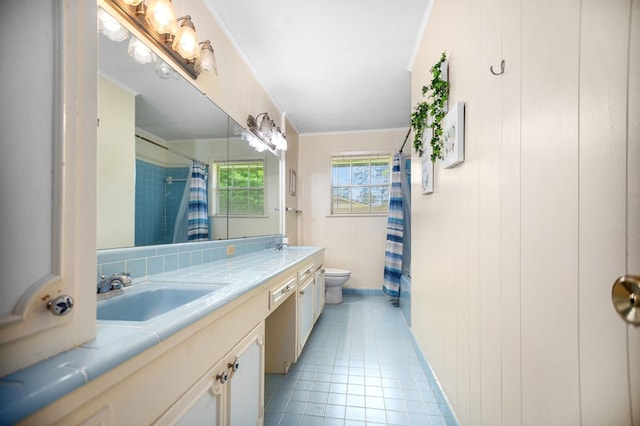 1308 Brook Holw, Lufkin, TX 75904 - bathroom with double vanity, tile patterned floors, and a shower with curtain
