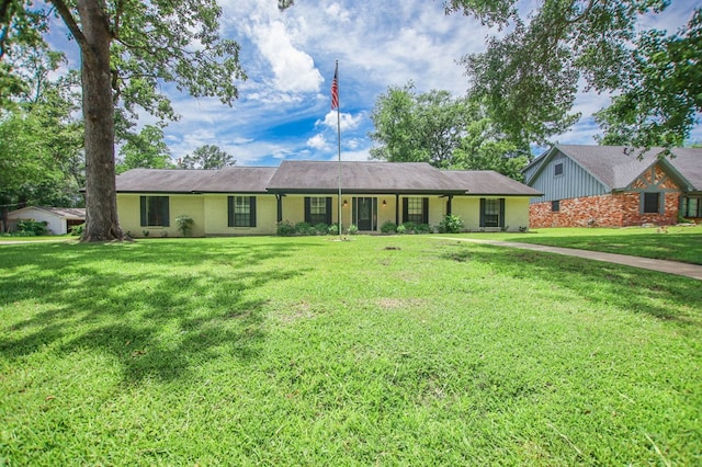 1308 Brook Holw, Lufkin, TX 75904 - ranch-style home featuring a front lawn and brick siding