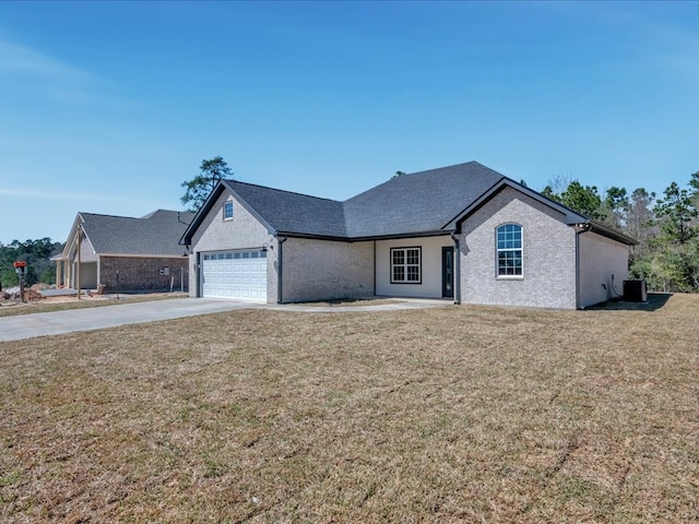 ranch-style house with a front yard, cooling unit, driveway, an attached garage, and brick siding