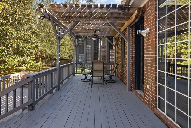 wooden terrace with a pergola