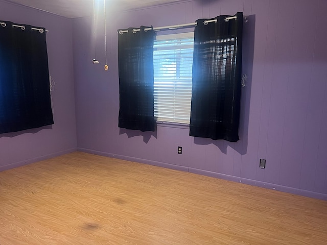 602 Devereaux, Diboll, TX 75941 - unfurnished room featuring wood finished floors and baseboards