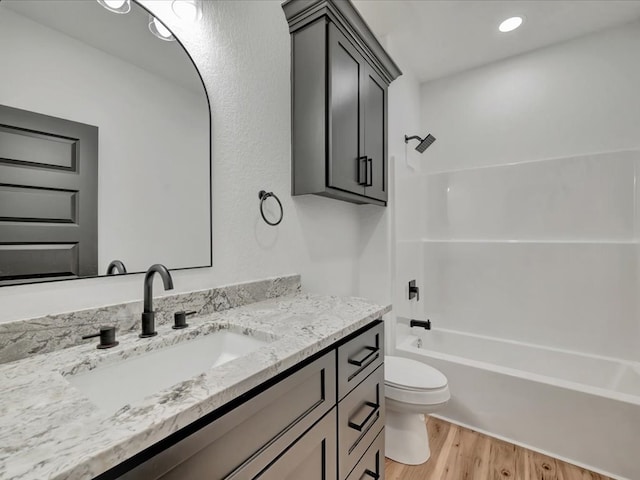 1920 Fm 842, Lufkin, TX 75901 - full bathroom featuring vanity, wood finished floors, and washtub / shower combination