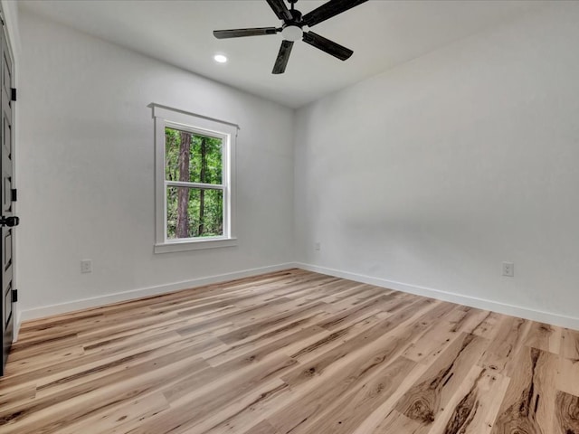 1920 Fm 842, Lufkin, TX 75901 - empty room with light wood-type flooring, a ceiling fan, and recessed lighting