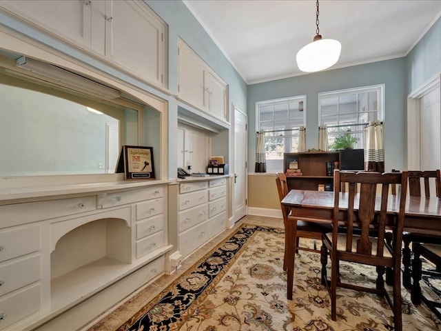 107 W Kerr Ave, Lufkin, TX 74904 - dining room featuring crown molding and light wood-style floors