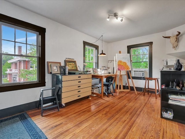 107 W Kerr Ave, Lufkin, TX 74904 - home office featuring light wood finished floors and cooling unit