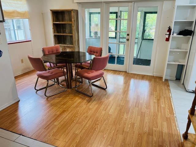 dining space featuring light hardwood / wood-style floors