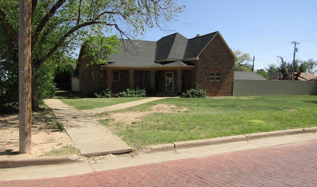 view of front of house with a front lawn