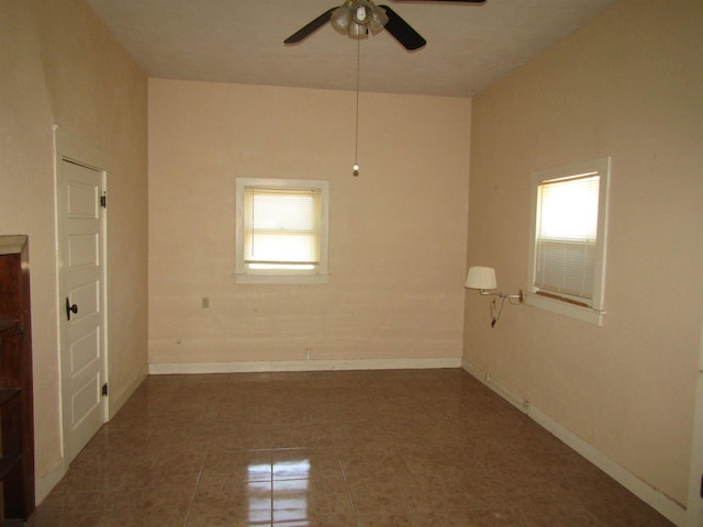 unfurnished room featuring ceiling fan