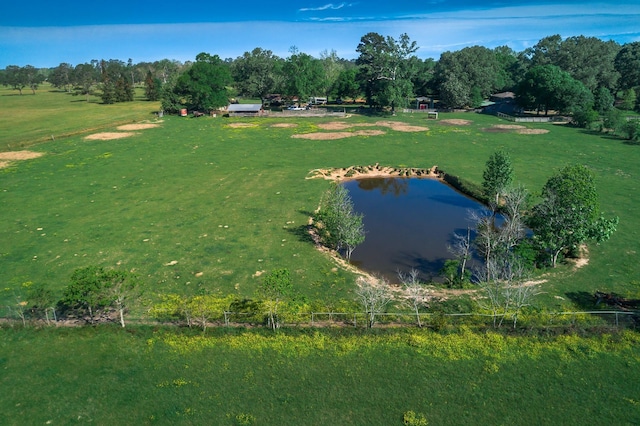 aerial view with a rural view and a water view