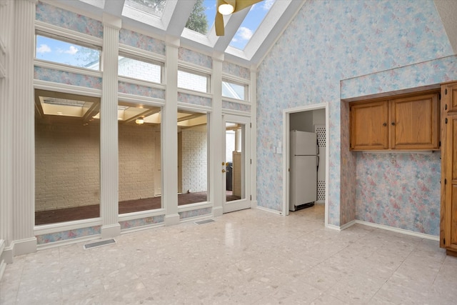 109 Innisbrook Dr, Lufkin, TX 75901 - unfurnished sunroom featuring a skylight and lofted ceiling