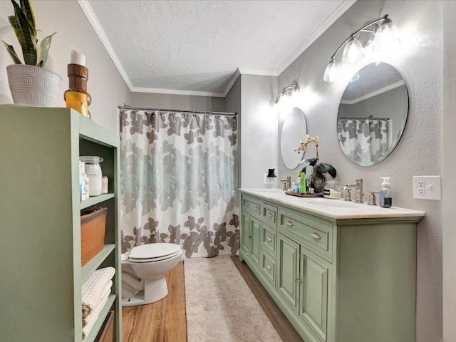 128 Tamie Lowe Rd, Moscow, TX 75960 - bathroom with wood finished floors, crown molding, double vanity, toilet, and curtained shower