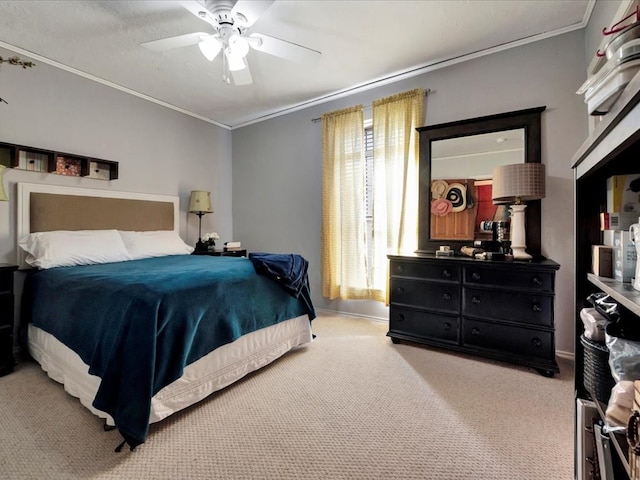 128 Tamie Lowe Rd, Moscow, TX 75960 - bedroom featuring crown molding, light colored carpet, and a ceiling fan