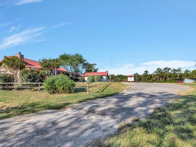 128 Tamie Lowe Rd, Moscow, TX 75960 - view of asphalt driveway
