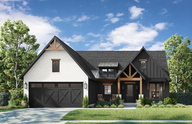 modern farmhouse featuring brick siding, a shingled roof, concrete driveway, board and batten siding, and a front yard