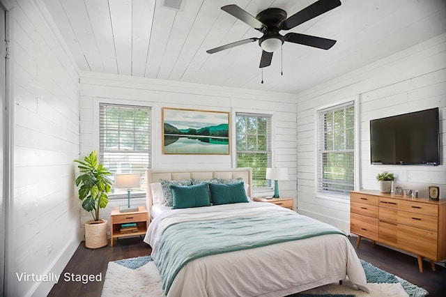 213 Lee Ln, Lufkin, TX 75904 - bedroom featuring wood walls, wood finished floors, wood ceiling, and a ceiling fan