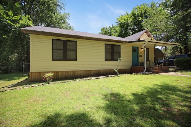 213 Lee Ln, Lufkin, TX 75904 - view of front of house with a front lawn and covered porch