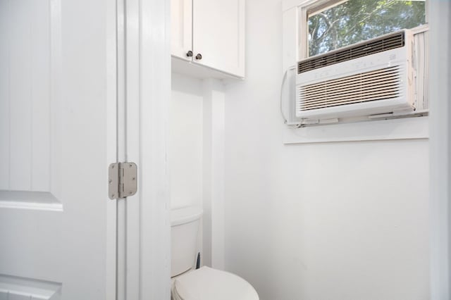 213 Lee Ln, Lufkin, TX 75904 - bathroom with toilet and cooling unit