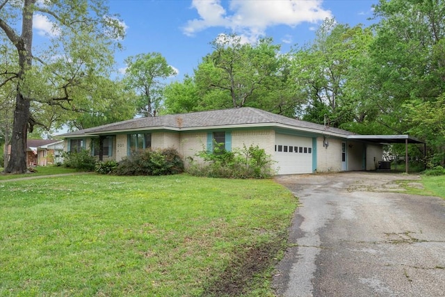 301 Cunningham Dr, Lufkin, TX 75901 - single story home featuring driveway, a front lawn, an attached garage, an attached carport, and brick siding