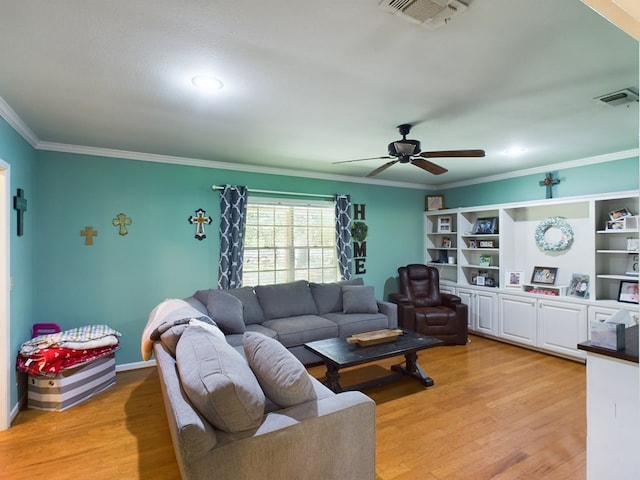 living room featuring ceiling fan, light hardwood / wood-style flooring, and ornamental molding