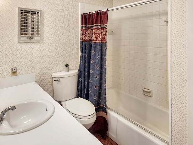 full bath featuring a sink, toilet, shower / bath combination with curtain, and wallpapered walls