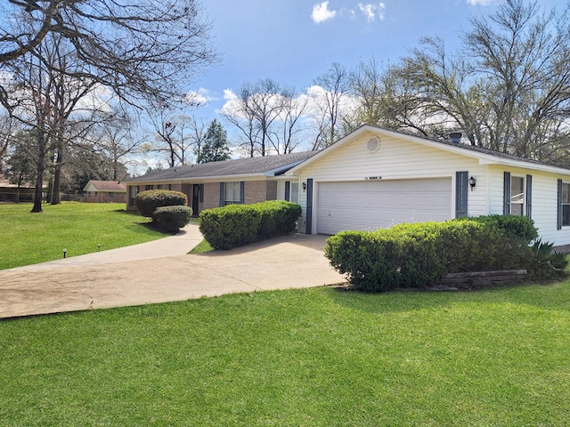 single story home featuring a front yard, an attached garage, brick siding, and driveway