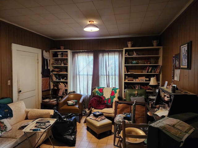 512 Tenaha St, Center, TX 75935 - living area with wood walls and crown molding