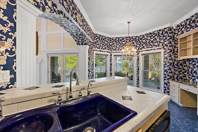 445 Riverbend Dr, Hemphill, TX 75948 - kitchen with tile counters, crown molding, a sink, and a chandelier