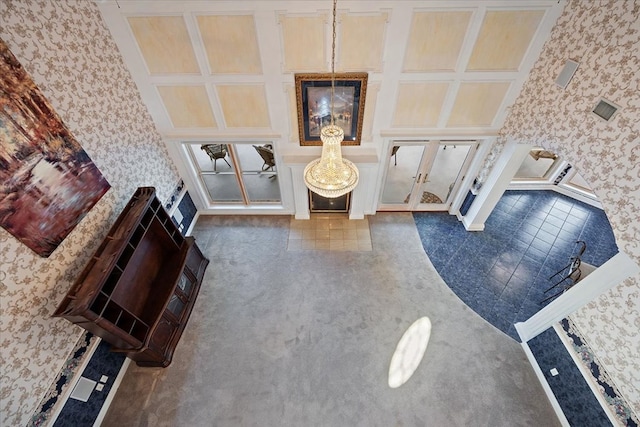 bathroom featuring coffered ceiling and french doors