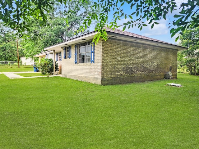 4296 US Highway 190 W, Jasper, TX 75951 - view of side of property featuring a yard and brick siding