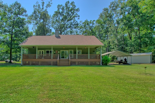 view of front of home featuring a carport, a porch, and a front lawn