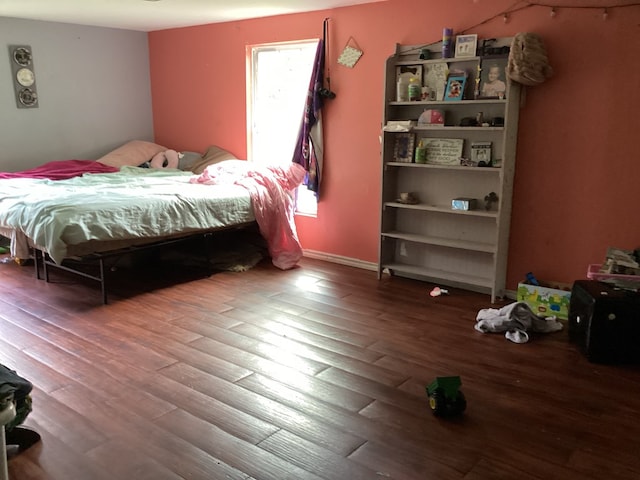 1734 Fm 82 W, Kirbyville, TX 75956 - bedroom featuring wood finished floors