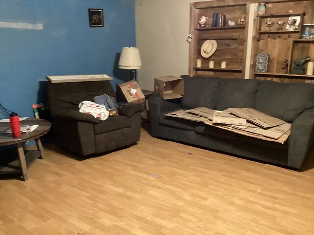 1734 Fm 82 W, Kirbyville, TX 75956 - living area featuring wood finished floors