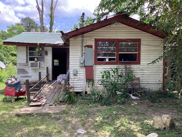 1734 Fm 82 W, Kirbyville, TX 75956 - view of front facade featuring metal roof and cooling unit