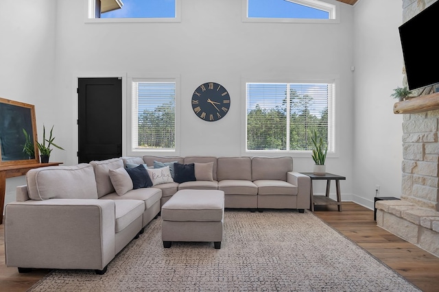 150 Tatanka Trl, Brookeland, TX 75931 - living area featuring wood finished floors and a high ceiling