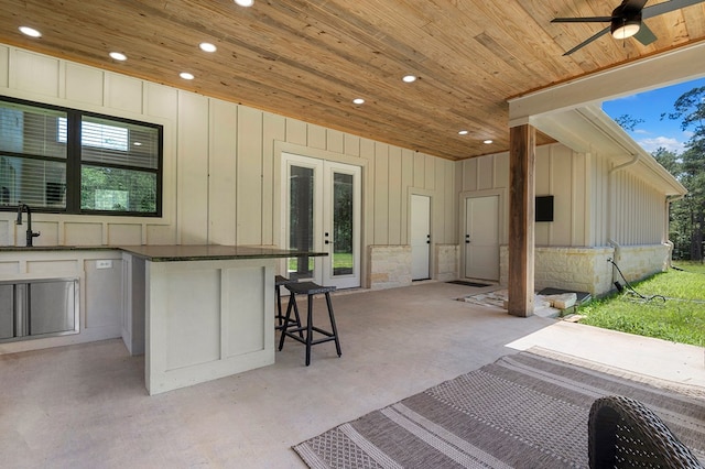 150 Tatanka Trl, Brookeland, TX 75931 - view of patio featuring a ceiling fan and exterior kitchen
