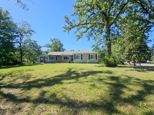 single story home with a front yard