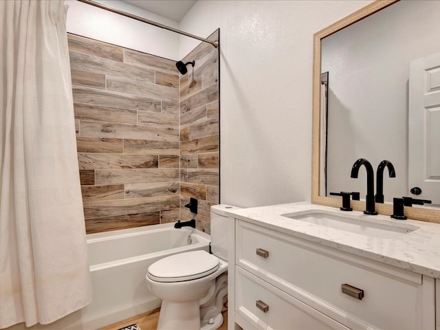 full bathroom featuring vanity, toilet, and shower / tub combo