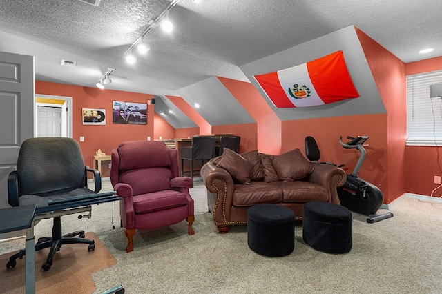 474 Mountain View Rd, Lufkin, TX 74904 - home theater room with carpet floors, baseboards, a textured ceiling, and track lighting