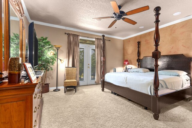 474 Mountain View Rd, Lufkin, TX 74904 - carpeted bedroom featuring access to outside, french doors, crown molding, a textured ceiling, and baseboards