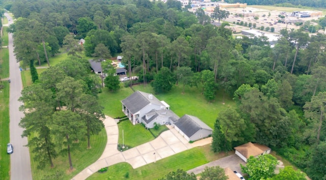 bird's eye view featuring a forest view