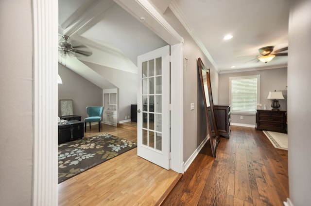 corridor featuring crown molding, recessed lighting, baseboards, and wood finished floors