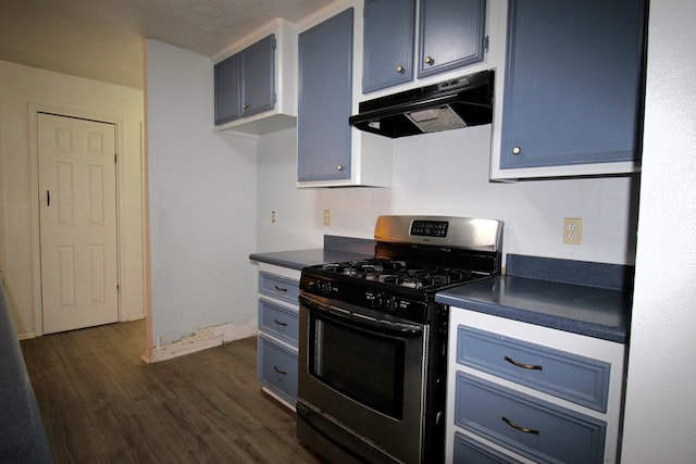 kitchen featuring dark wood-type flooring, blue cabinets, and stainless steel gas range