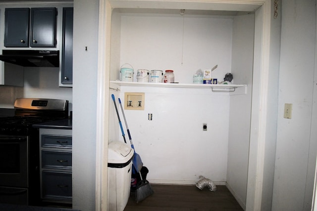 washroom with dark hardwood / wood-style floors and hookup for an electric dryer