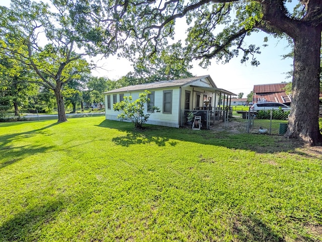 663 Mount Carmel Rd, Lufkin, TX 75904 - view of side of home featuring a gate