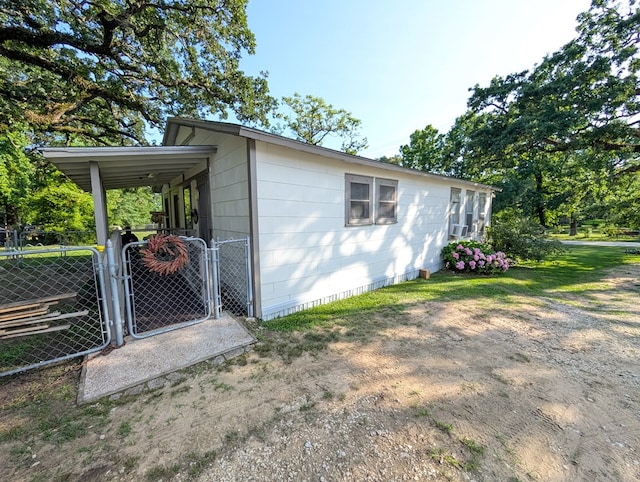 663 Mount Carmel Rd, Lufkin, TX 75904 - view of outbuilding featuring a gate